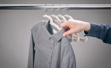 Load image into Gallery viewer, Mozu Hangers with fully button collared shirt removal on clothing rod
